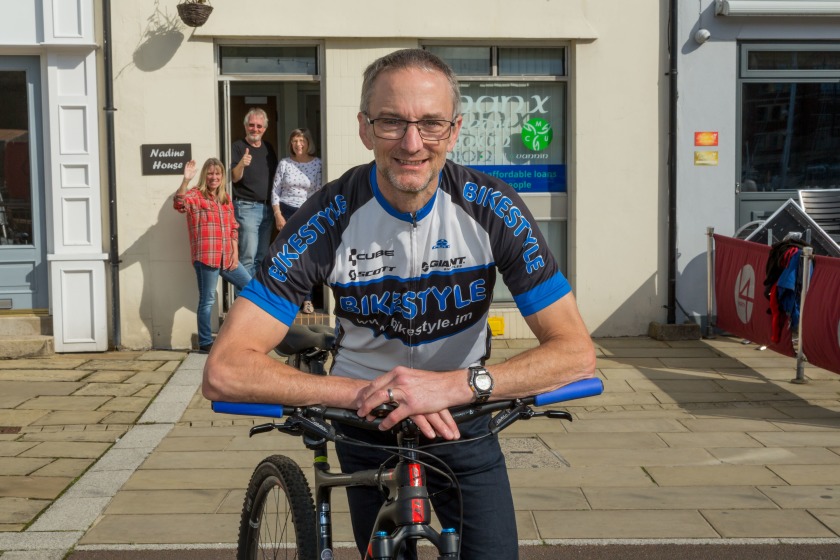 Adrian with his mountain bike outside the MCU office